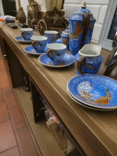 Juego de té de porcelana azul con diseño de dragón - miniatura 1