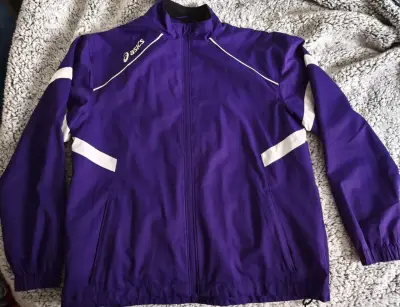 Chaqueta deportiva morada Asics unisex - miniatura 1