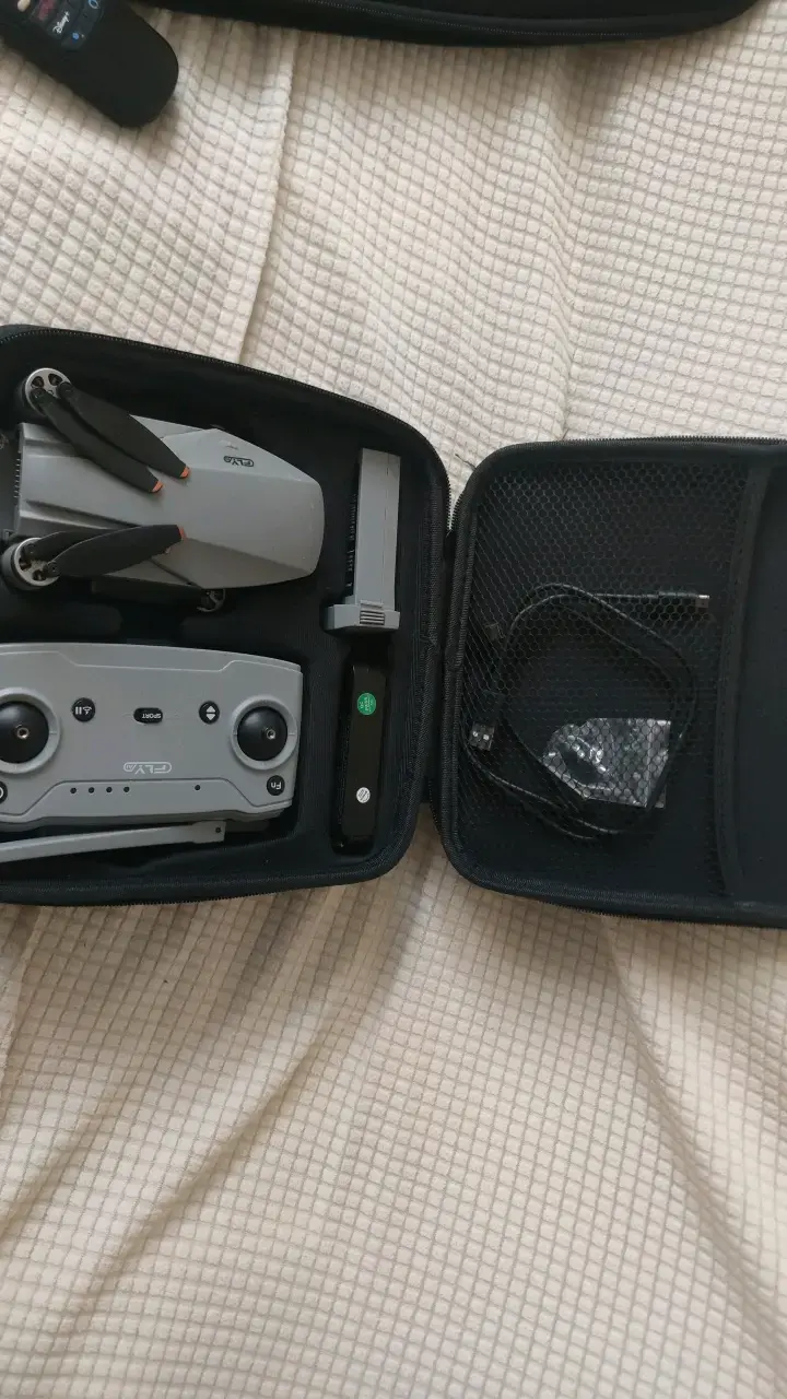 Drone plegable con control remoto y accesorios - 1