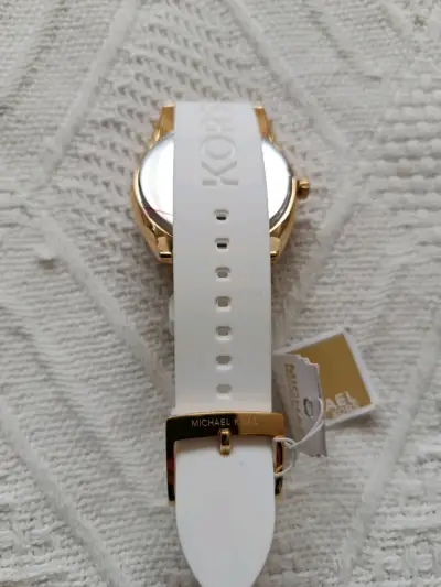 Reloj Michael Kors dorado con correa blanca - miniatura 2