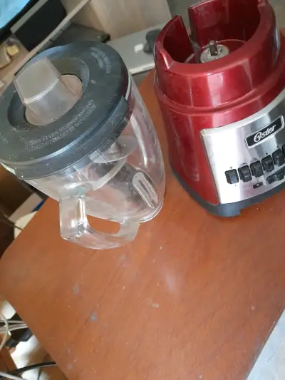Licuadora Oster roja con vaso de vidrio - miniatura 1
