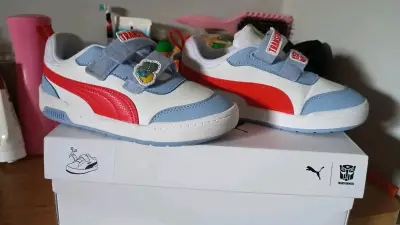 Zapatillas infantiles Puma Transformers azul y rojo - miniatura 1