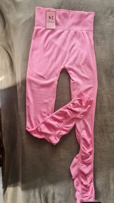 Leggings rosados con volantes para mujer - miniatura 1