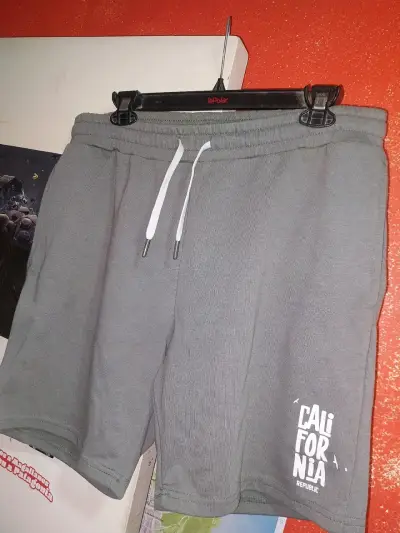 Shorts deportivos grises fashions park - miniatura 1