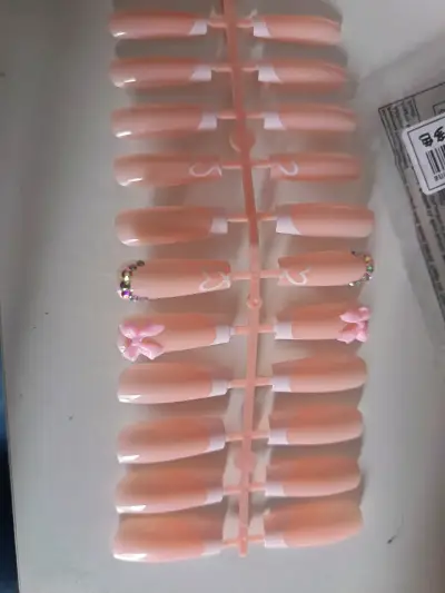 Uñas postizas decoradas con pedrería y lazos - miniatura 4