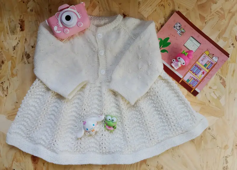 Vestido de lana blanco para bebé