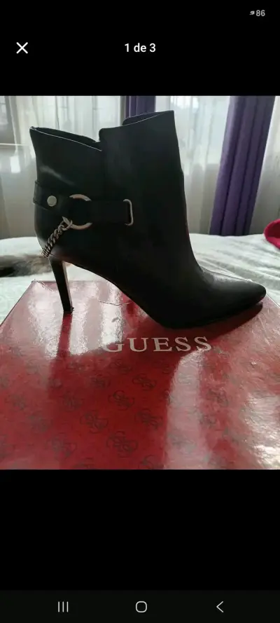 Botines de cuero negro Guess con tacón alto - miniatura 1