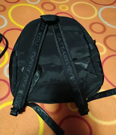 Mochila y mini bolsos $5.000 c/u - miniatura 2