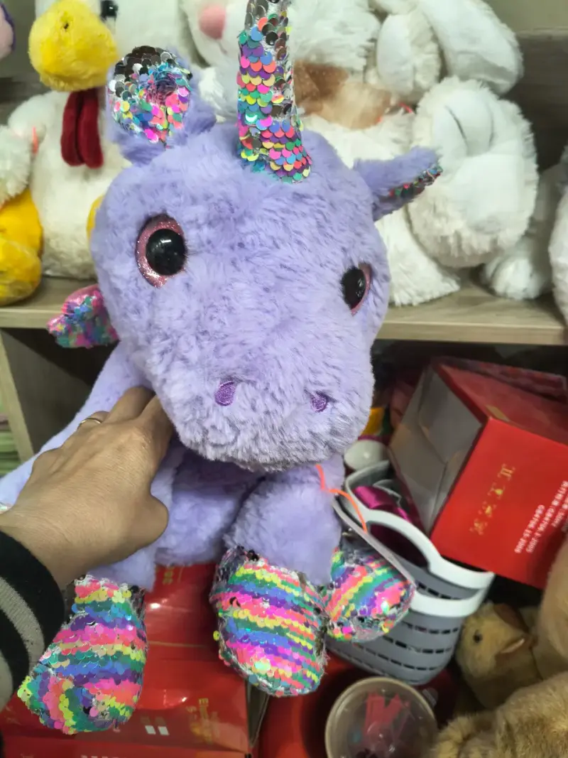 Peluche de conejo gris con lazo azul - 2