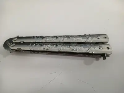 Cuchillo mariposa de entrenamiento metálico - miniatura 1