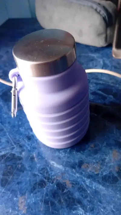 Botella plegable de silicona morada - miniatura 1