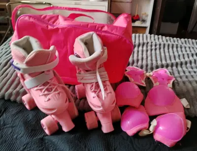 Patines de cuatro ruedas rosados con protecciones y bolso - miniatura 1