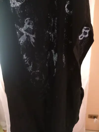 Polera sin mangas negra con cuello alto - miniatura 2