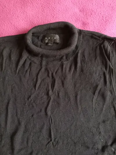 Polera sin mangas negra con cuello alto - miniatura 3
