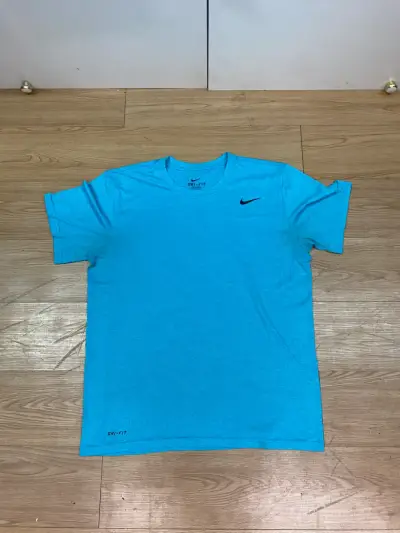 Polera deportiva Nike Dri-FIT azul para hombre - miniatura 1