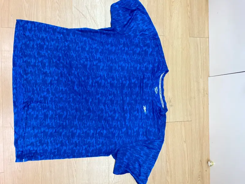 Polera deportiva azul Reebok para hombre