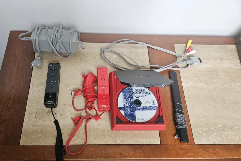 Nintendo Wii Mini Roja + 2 Controles + Smash Bros - 2