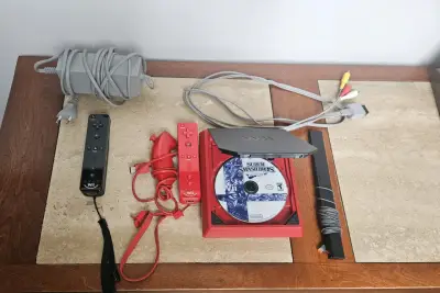 Nintendo Wii Mini Roja + 2 Controles + Smash Bros - miniatura 2