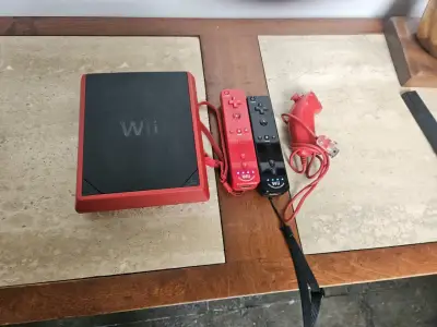 Nintendo Wii Mini Roja + 2 Controles + Smash Bros - miniatura 4