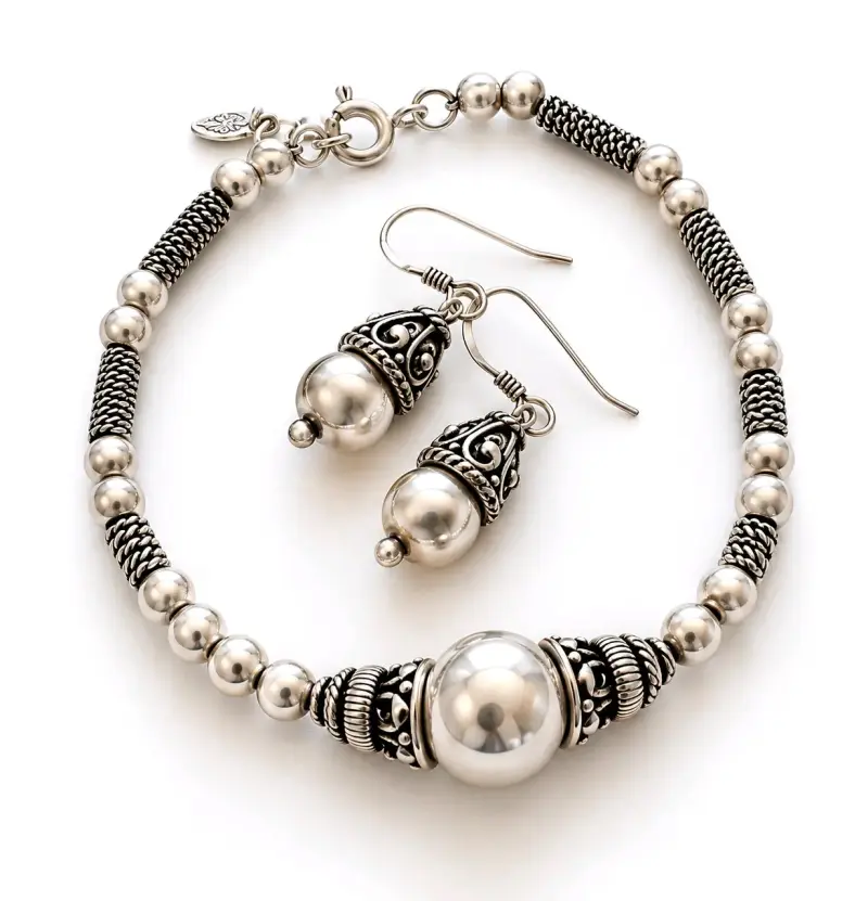 Conjunto de pulsera y aros de plata