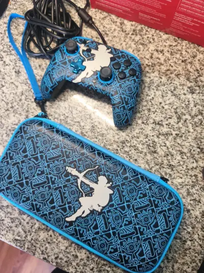 Nintendo Switch OLED con Super Smash Bros Ultimate y accesorios Zelda - miniatura 5