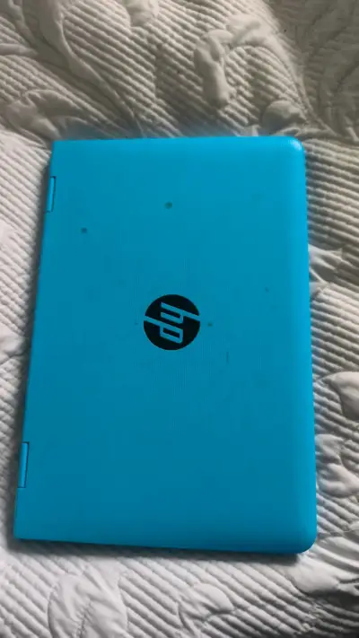 Notebook convertible HP azul en buen estado - miniatura 1