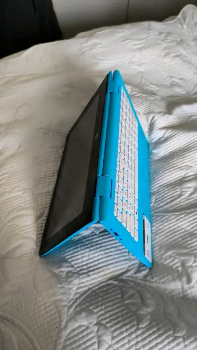 Notebook convertible HP azul en buen estado - miniatura 3