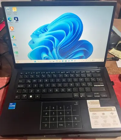 ASUS Vivobook 14" i5 12va Gen 12gb ram• 512GB SSD - miniatura 1