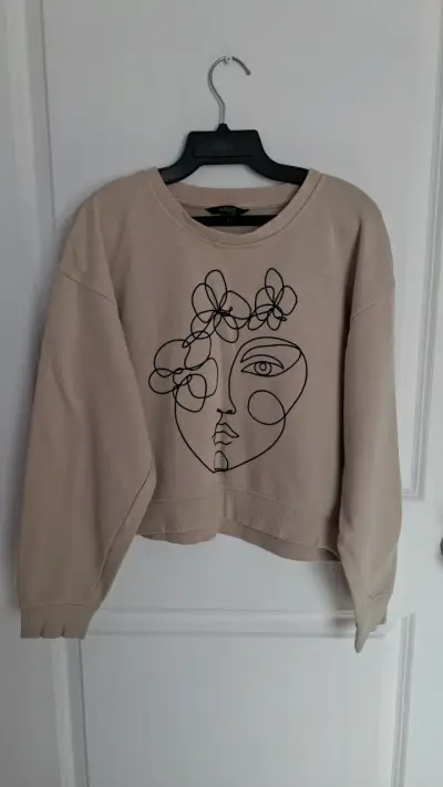 Polerón beige con diseño de rostro Marquis - miniatura 1
