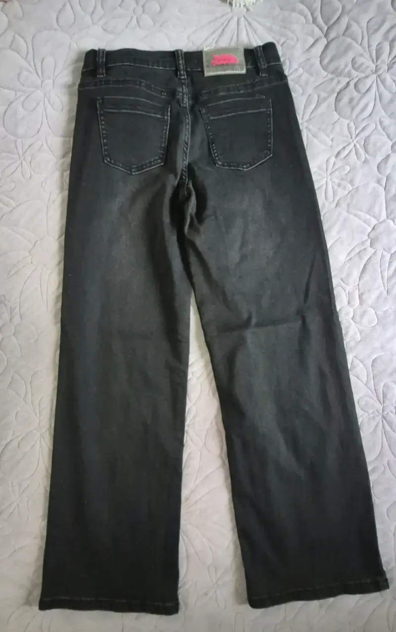Jeans negros de niña en buen estado - 2