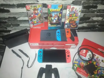 Consola Nintendo Switch con juegos y accesorios - miniatura 1