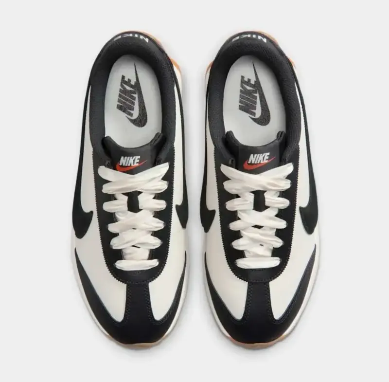 Zapatillas deportivas Nike blancas y negras - 2