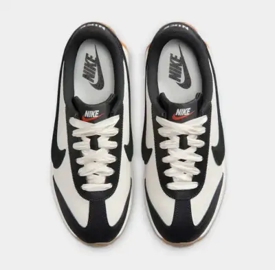 Zapatillas deportivas Nike blancas y negras - miniatura 2