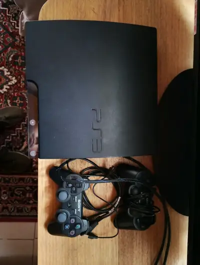 Consola PS3 con dos controles Sony - miniatura 1