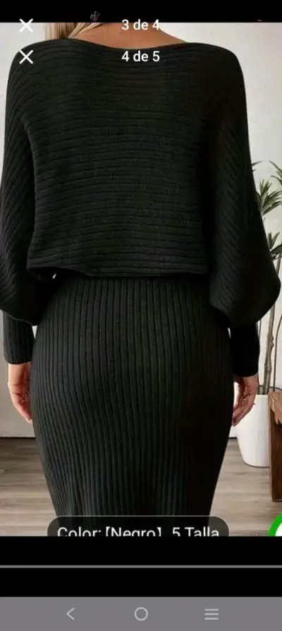 Vestido negro de punto con cinturón decorativo - miniatura 1