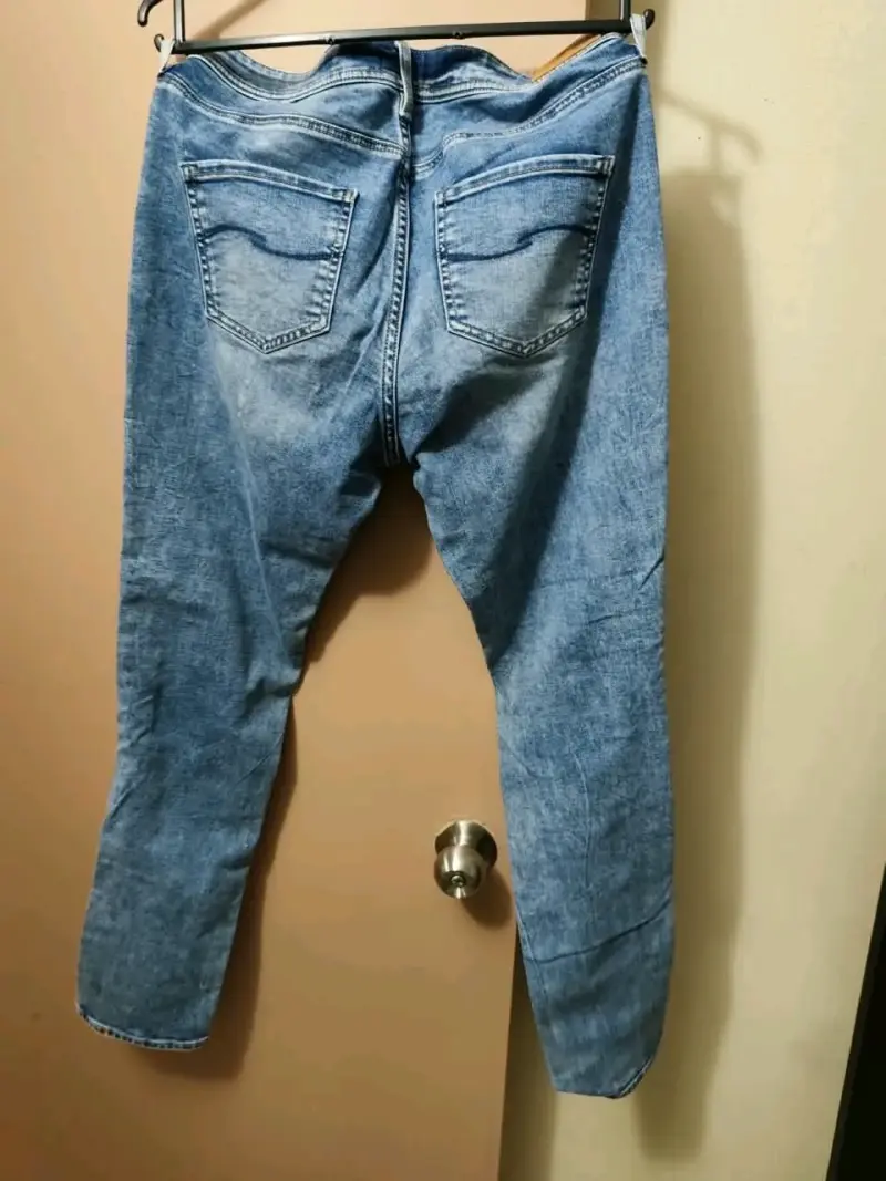 Jeans ajustados de mezclilla azul para mujer - 3