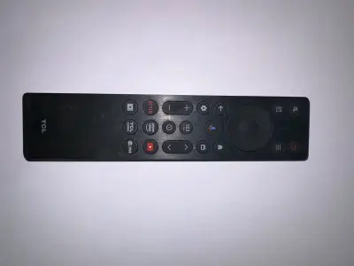 Control remoto universal negro para TV - miniatura 1