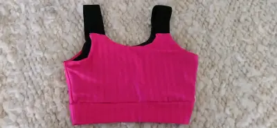 Top deportivo rosa para mujer - miniatura 1