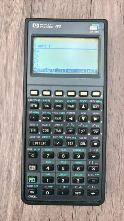 Calculadora gráfica HP 48G con funda y manual - miniatura 1
