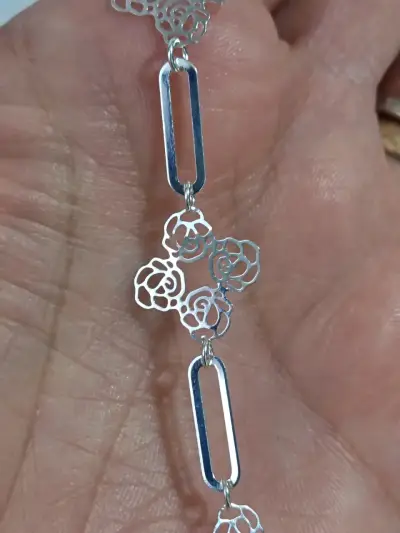 Pulsera de plata con diseño floral calado - miniatura 1