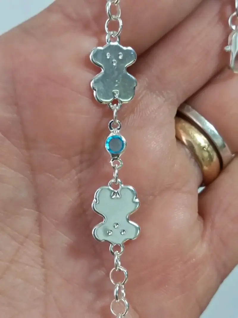 Pulsera de plata con dijes de osito y cristal azul - 1
