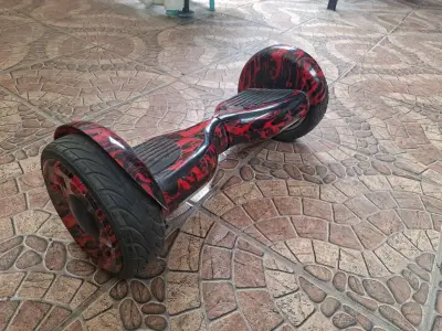 Hoverboard eléctrico rojo y negro - miniatura 1