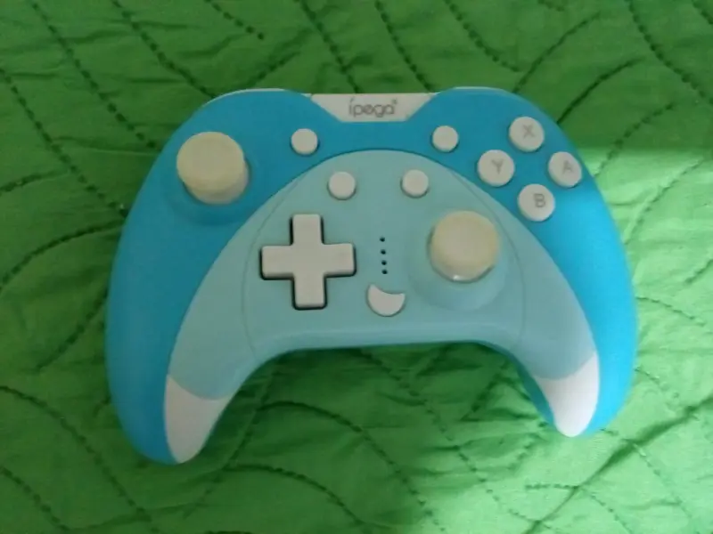 Control inalámbrico azul para videojuegos Ipega