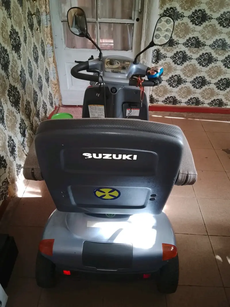 Scooter eléctrico rojo para movilidad reducida - 6