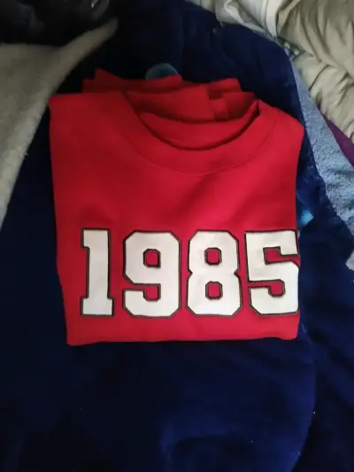 Polerón rojo con estampado 1985 - miniatura 1