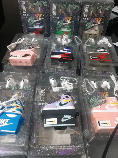 Auriculares inalámbricos estilo zapatilla Nike - miniatura 1