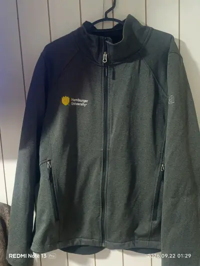 Chaqueta The North Face gris con logo bordado - miniatura 1