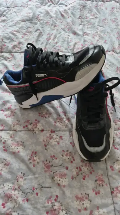 Zapatillas deportivas Puma negras y azules - miniatura 1