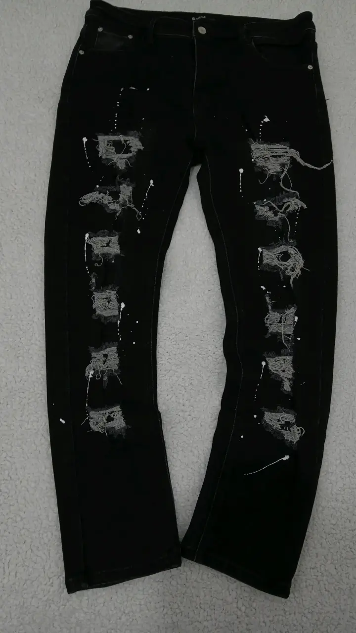 Jeans negros desgastados para hombre