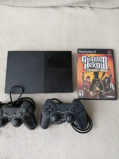 Consola PlayStation 2 con juego Guitar Hero III - miniatura 1